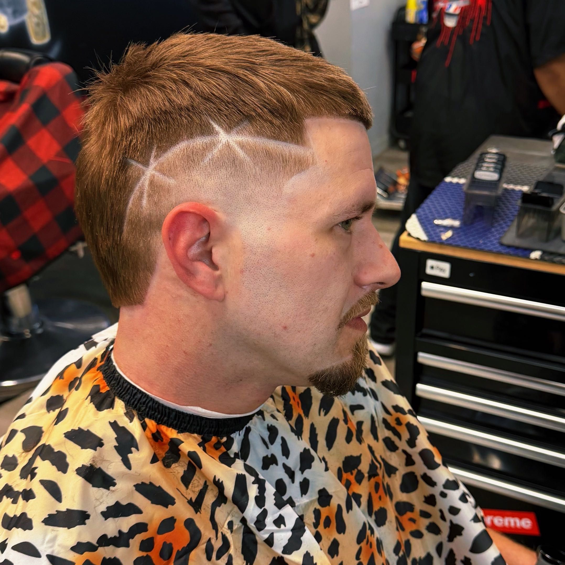 A finished CutzbyBanks haircut showing the blending and edge detail